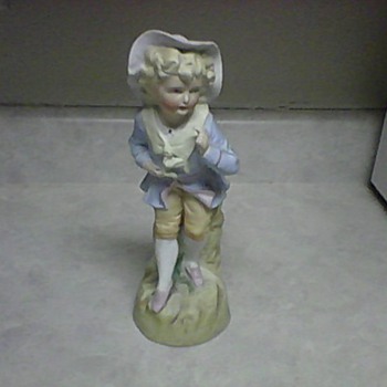 NO. 25 PORCELAIN FIGURINE - Figurines