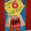coca cola cardboard sign