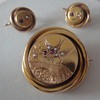 Round Victorian yellow gold brooch and matching earrings