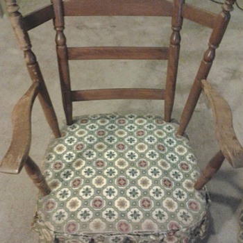 Wing back rocking chair.