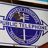 2 Different Arkansas Associated Telephone company signs 