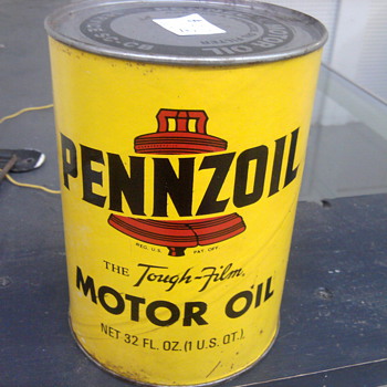 This Pennzoil can was never opened.  Style is classic isn't it?