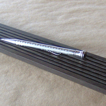 Re-purposed ebony guitar neck pen trays by Mark Weisbeck