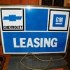 Old Chevrolet GM leasing dealership sign