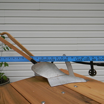 A old toy plow