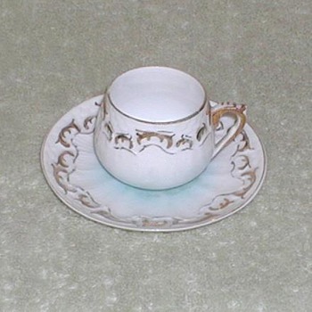 Porcelain demitasse cup & saucer blue tint