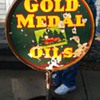 porcelain gold medal oil sign