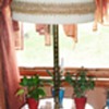 Nice amber glass table lamp and the bottom lights up too.  