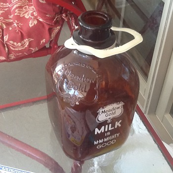 My old brown glass Meadow Gold gallon jug.