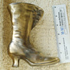 Antique brass womens boot 6" tall5" long, 2 wide