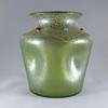 Loetz pinched Ciselé vase with enamel and cabochons.
