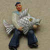 Fisherman and sunning lady brooches