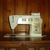 Singer sewing machine in a cabinet
