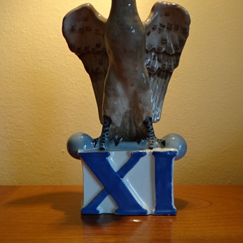 CZECHOSLOVAKIA POTTERY  FIGURINE  EAGLE XI WITH BARBELL WITH WEIGHTS - Art Pottery