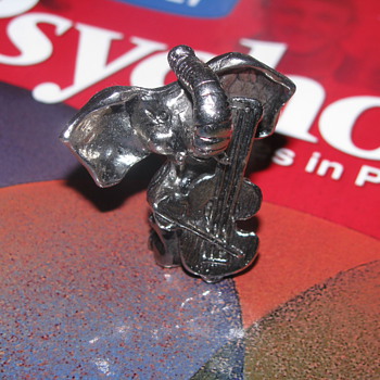 Pewter elephant playing cello - Animals