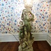 What is this? A 3 foot tall ceramic like lamp of 2 ladies and a child. 