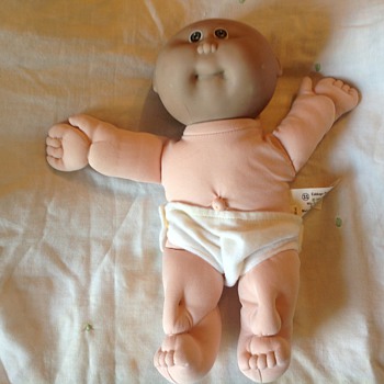 Cabbage patch baby with black head and white body...has anyone else encountered this? - Dolls