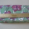 Anyone know how old or the pattern name of this coach wallet?
