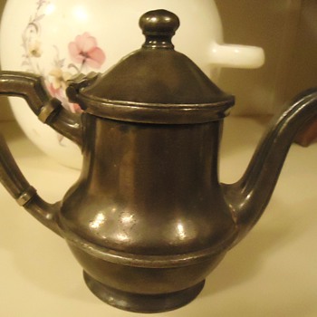The Wallingford Silver Plate 8 oz. Teapot and Wm. A. Rogers plate - Kitchen