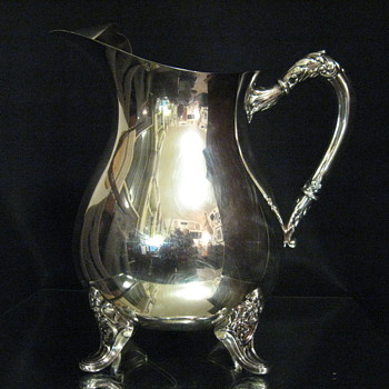c.1944 C.D. PEACOCK  JEWELER SILVER PLATED WATER PITCHER.