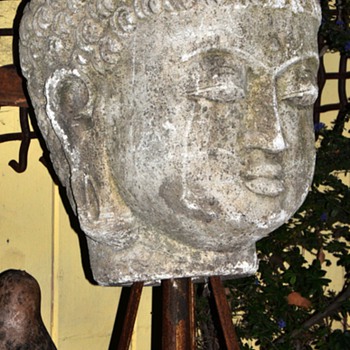 Enormous Buddha Head Mounted on a Tall House Jack