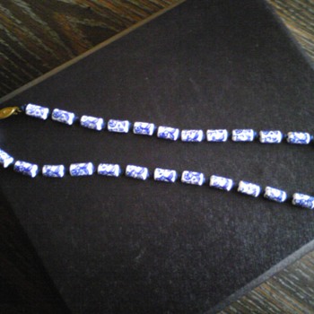 blue and white koi beads on knotted blue silk