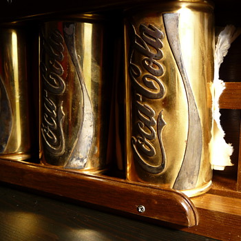 Golden coke cans
