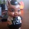 A very cool, old piggy bank with beautiful glass eyes