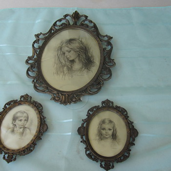 Framed silk portraits