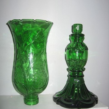 A family treasure candlestick with a broken globe