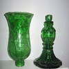 A family treasure candlestick with a broken globe