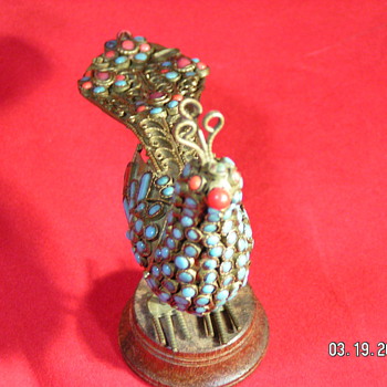 I am told it is late 19th century Victorian Peacock - Victorian Era