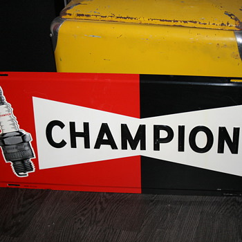 champion tin sign
