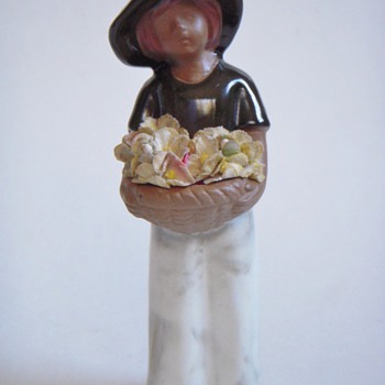 Little Clay Flower Girl w/unidentified Sticker
