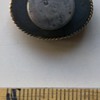 Unknown small stud in gold coloured metal and ivory with 3 letters "L C H"?