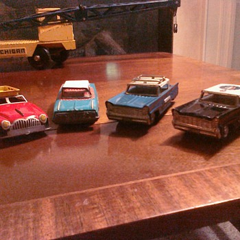 Tin toy friction cars found in dime stores but made in Japan...friction powered.