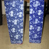 Two blue-flowered vases