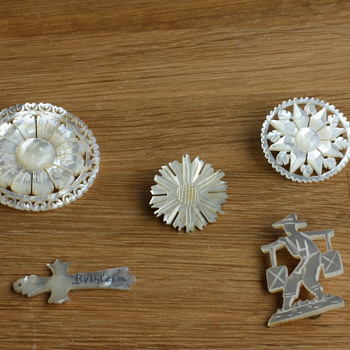 Mother of pearl pendant and brooches