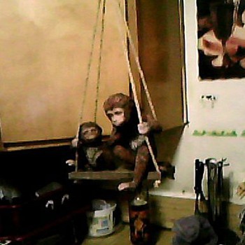 TWO MONKEYS ON A SWING