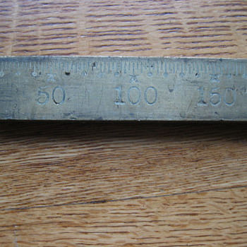 Is this some kind of brass ruler???