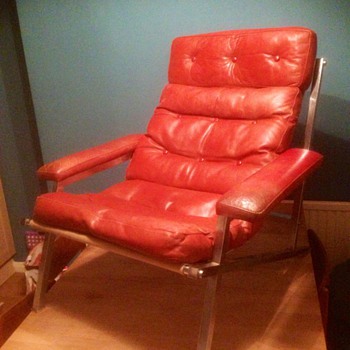 Trying to work out the designer of this leather lounge chair