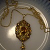 Antique Topaz pendent and chain.