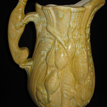 Majolica Pitcher with Greyhound handle and hanging hunted animals - Art Pottery