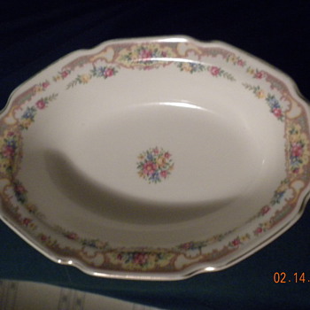 Oval bowl with painted flowers