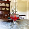 Can you substitute non-kerosene oil in an old lamp?