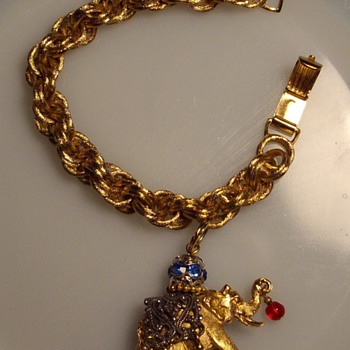 Napier single elephant charm bracelet.