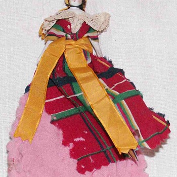 the tiny bisque doll is a pin cushion - Dolls