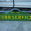 1932 Pharmacy and Curb service sign