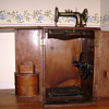New Home Sewing Machine in Cabinet, circa late 1800s