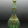 Bohemian enameled uranium glass barbers bottle
